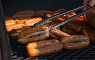 Lamb sausages smoking at Potterland Farm and Smokery